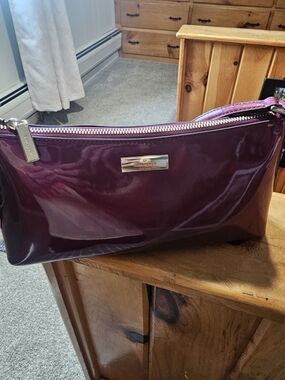Coach Patent Leather Wristlet in Plum